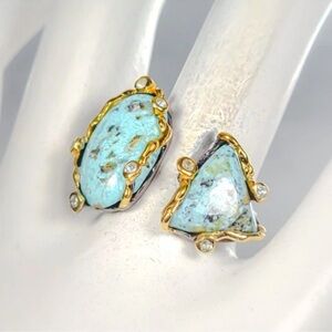 Sterling silver art ring with turquoise stones